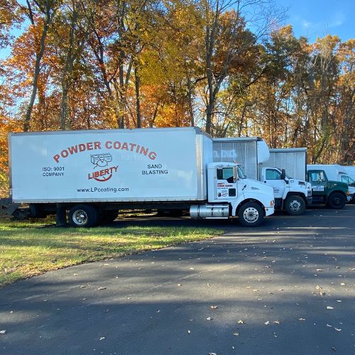 picture of delivery trucks from liberty powder coating